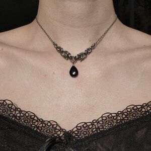 Gothic black teardrop and silver chainmail necklace with a small silver chain